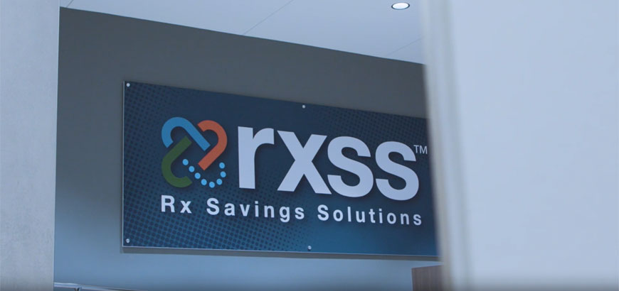 RxSS logo on a wall in an office.