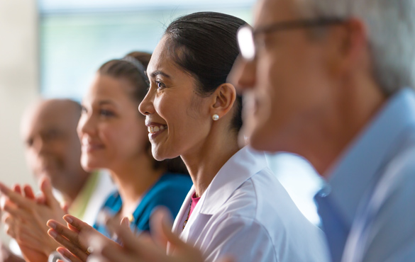 A group of doctors clapping