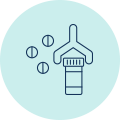 Assembly line icon depicting prescription bottles being capped