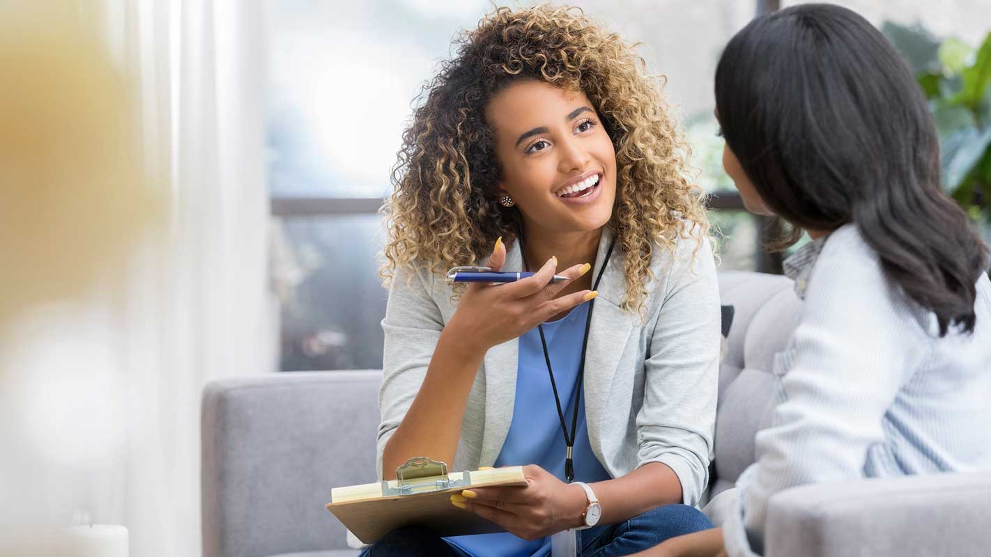 A doctor speaking with a patient